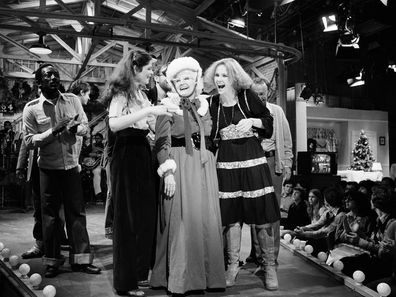 Miskel Spillman is seen on stage at "Saturday Night Live" on December 17, 1977, following her debut as host. Spillman, a then-80-year-old grandmother from New Orleans, won a contest that put her on one of television's biggest stages. She's pictured with Garrett Morris, Gilda Radner and granddaughter, Janine Baker.