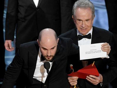  'La La Land' producer Jordan Horowitz holds up the winner card reading actual Best Picture winner 'Moonlight' onstage during the 89th Annual Academy Awards at Hollywood & Highland Center on February 26, 2017 in Hollywood, California. 