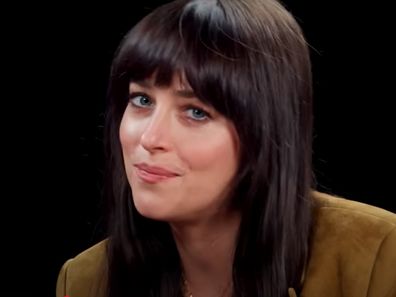 Dakota Johnson jokes about Madame Web backlash during an interview on Hot Ones