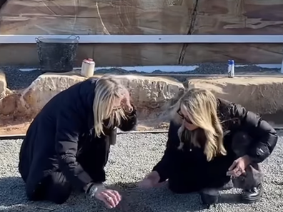 Jackie O buries crystals underneath new house build.