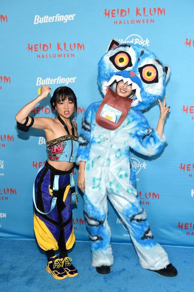 NEW YORK, NEW YORK - OCTOBER 31: Rei Ami and EJAE attend Heidi Klum's 24th Annual Halloween Party presented by Butterfinger and Huluween on Disney+ at Hard Rock Hotel New York on October 31, 2025 in New York City. (Photo by Noam Galai/Getty Images for Heidi Klum Halloween)