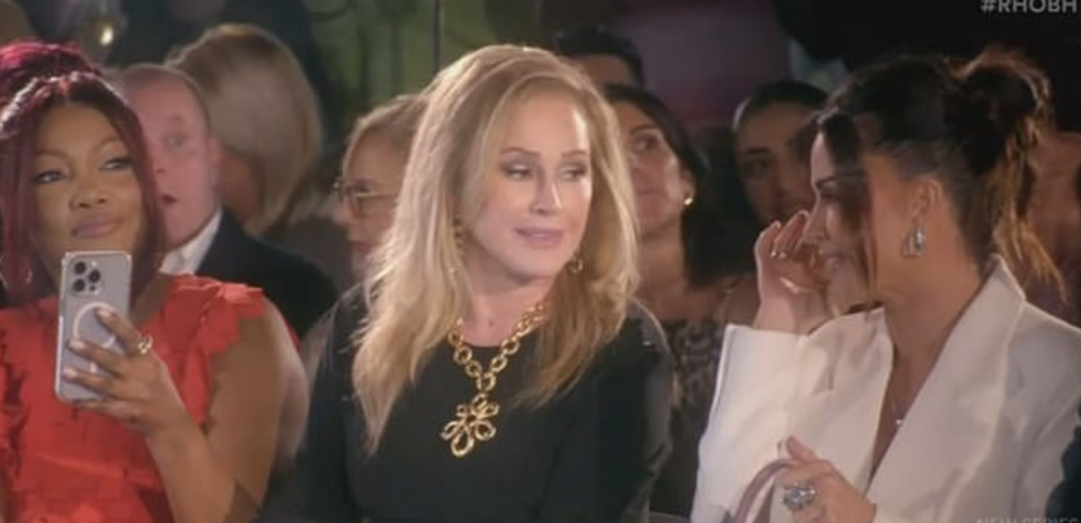 Sutton Doesn’t Regret Calling Dorit A B*tch In her Home, Talks Kathy Hilton’s Runway Moment & RHOBH Reunion 