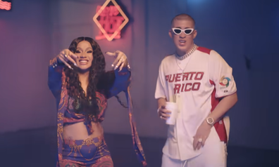 Bad Bunny and Cardi B in the I like it like that music video 