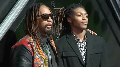In this image from video, Lil Jon stands with his son, Nathan Smith, in New York, on Oct. 24, 2018.