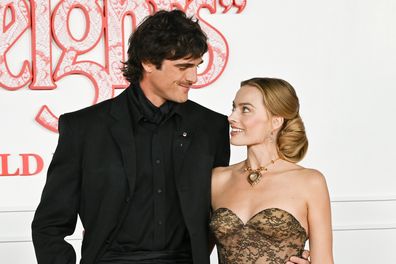Jacob Elordi and Margot Robbie attend the world premiere of Wuthering Heights at TCL Chinese Theatre on January 28, 2026 in Hollywood, California. 