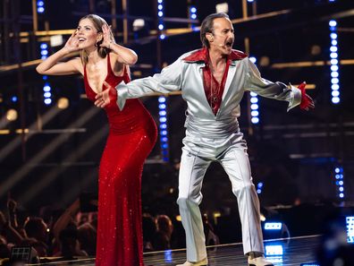 VIENNA, AUSTRIA - MAY 11: Victoria Swarovski and Michael Ostrowski speak onstage during the second dress rehearsal for the semi-final 1 of the 2026 Eurovision Song Contest at Wiener Stadthalle on May 11, 2026 in Vienna, Austria. (Photo by Christian Bruna/Getty Images)